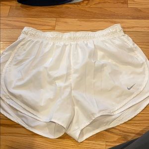 White Nike shorts